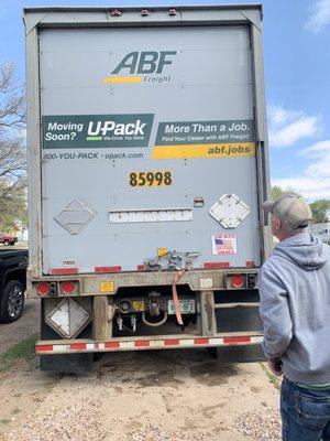 Our upack trailer, 28 foot. Comes with a ramp and two wooden pieces to make a wall to hold all your things in.