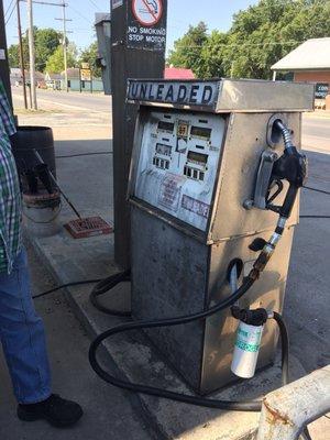 Full service gas station!  They'll pump your gas and wash your windshield.