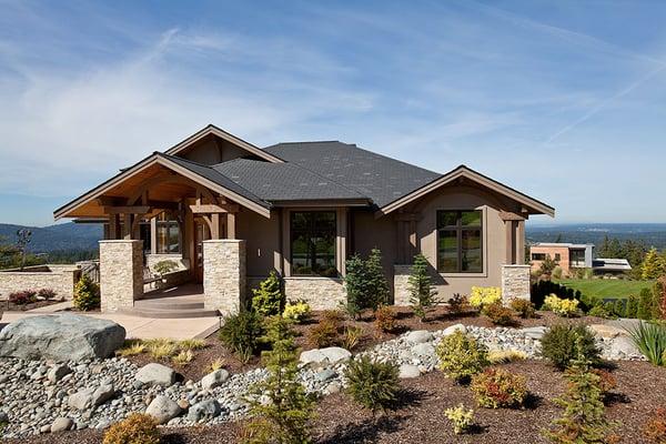 A dry creek bed creates the framework for this alpine-inspired planting.