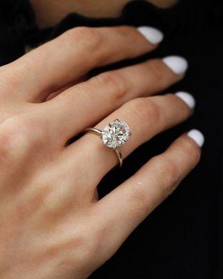 Simple and timeless Oval Engagement Ring by Dallas Diamond Factory