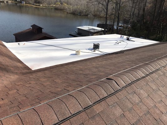 Tpo Flat roof membrane along with architectural shingles