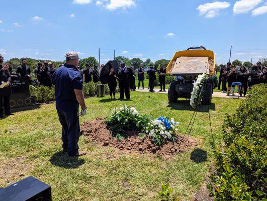 Dignity Memorial employees performing burial.