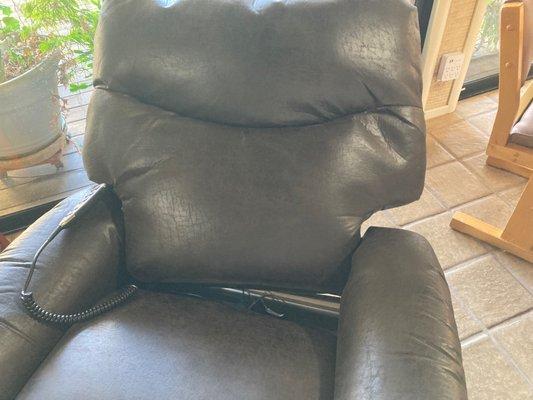 Laz Boy recliner delivered this afternoon was NOT assembled properly & fell apart.