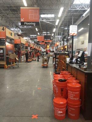 Cash registers have barrels in front of them to keep the distance