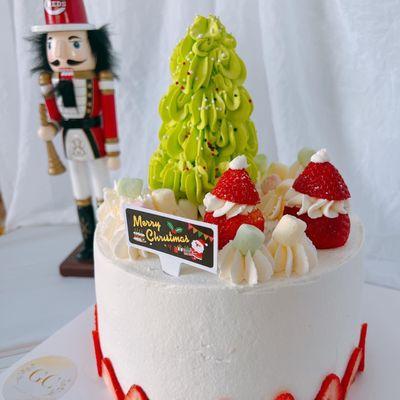 Christmas themed fresh cream and fruit chiffon cake.