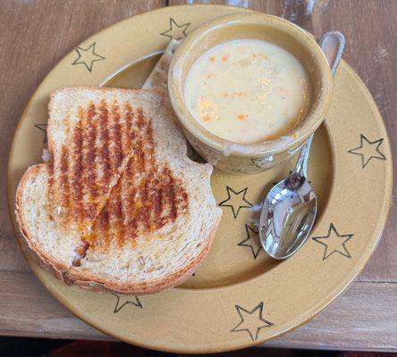 Chicken salad panini with creamy potato soup.