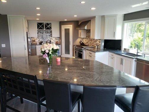 Removed 2 bearing walls to make the most spacious beautiful kitchen