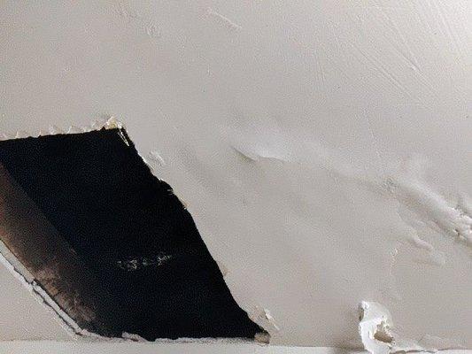 Ceiling with water damage tested for mold