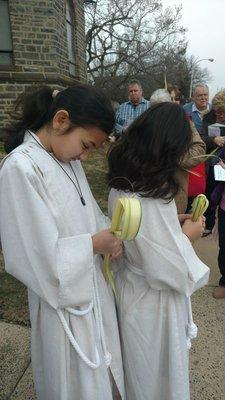 Young Acolytes reflecting upon the meaning of Palm Sunday