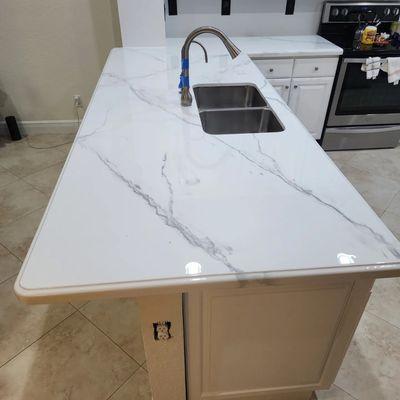 Cabinets and countertops after refinishing project.