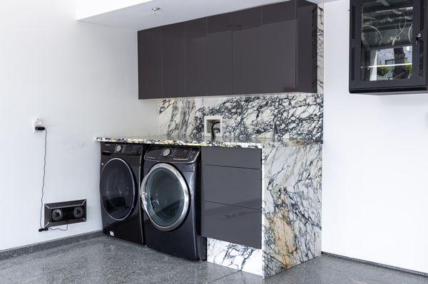 European style Glossy Grey cabinets vs Antolini Paonazzo Black Gold Marble. Luxury Laundry Room Design.