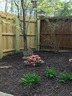 Installation of mulch and flowers.