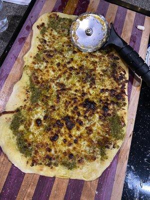 Pesto provolone pizza.