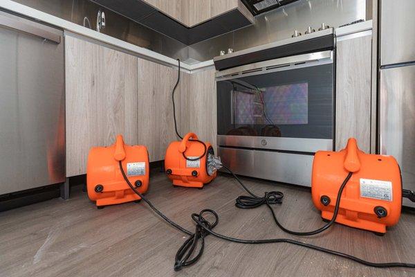 drying out a brand new kitchen to prevent further damage to floors