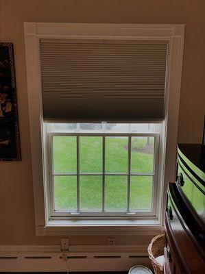 Room darkening cellular shades make sleeping in easy!