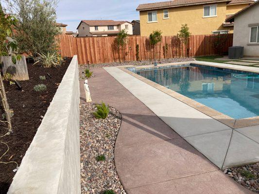 new retaining wall, hardscaping and plants