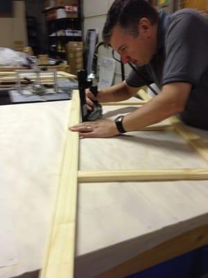 Creating a large stretcher frame for a canvas print.