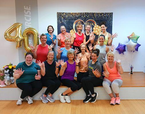 Celebrating 40 years of providing Jazzercise fitness classes in Lexington, KY! Owner Cindy McGeorge (center-red) and some of our community