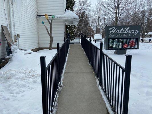 Accessibility entrance and sign