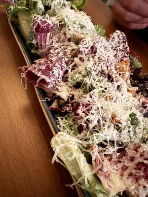 Bright salad with a miso Caesar dressing: garlic croutons, capers, pine nuts and Parmesan cheese.