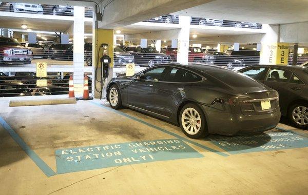 Electric Car Charging Stations are located in Daily parking on the 3rd level in the Yellow Section, aisle E. Charging fee of $5/charge.