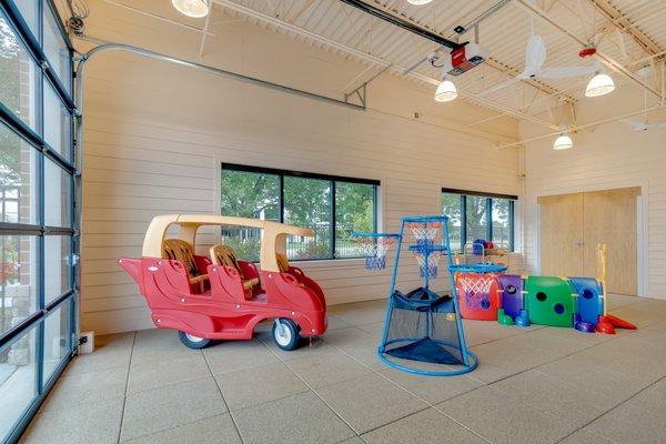 Indoor play spaces so that children can play and develop gross motor skills no matter the weather.