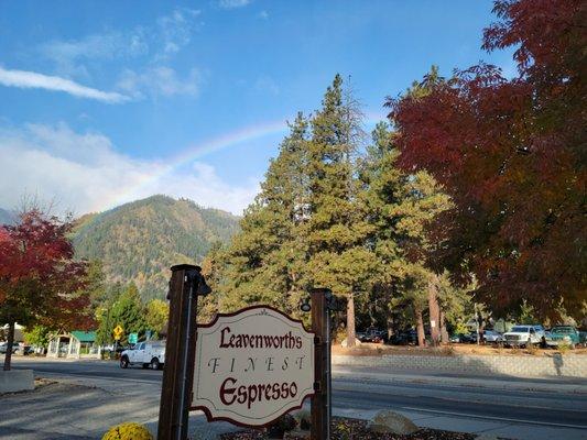 The Leavenworth Finest Espresso sign with a rainbow