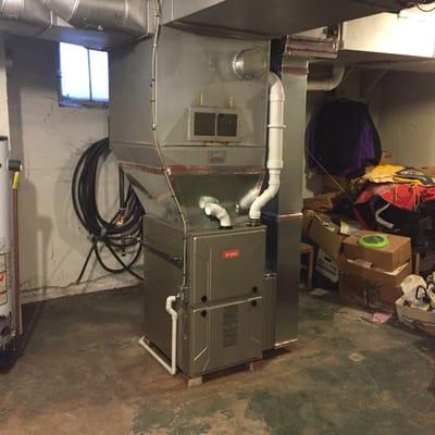 A new gas furnace that replaced an old giant.
 The results were lower energy bills and a happy homeowner!