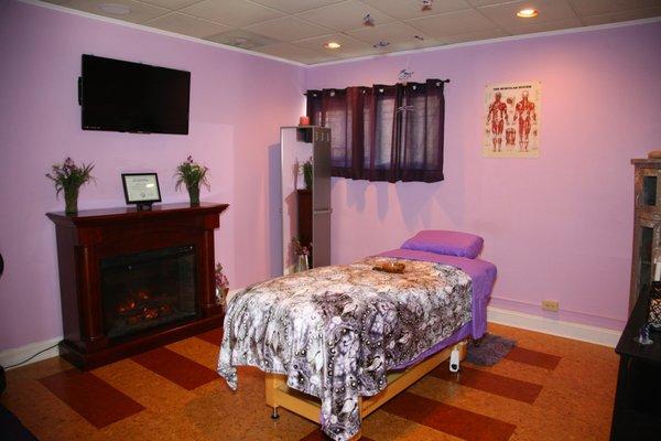 Enjoy your massage in a serene room with fireplace and/or headed table.