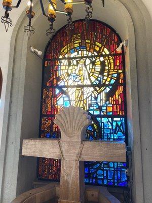 Our Lady of Mount Carmel stained glass window at the entrance