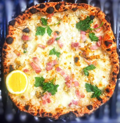 Cherrystone Clam Pizza with Smoked Pancetta and Buffalo Mozzarella.