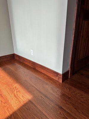 Hardwood stained trim install with plinth blocks