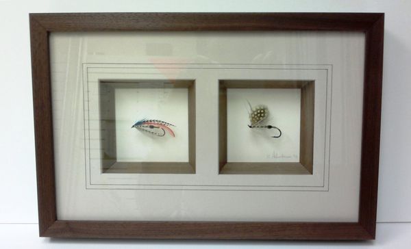 Shadow box for fishing flies.