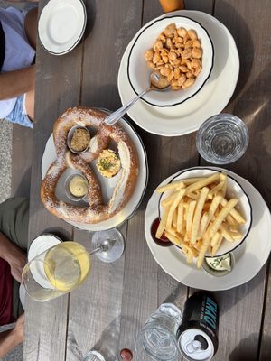 Wine, cider, fries, almonds and pretzels