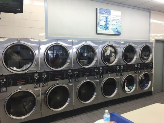 Drying machines along the back wall