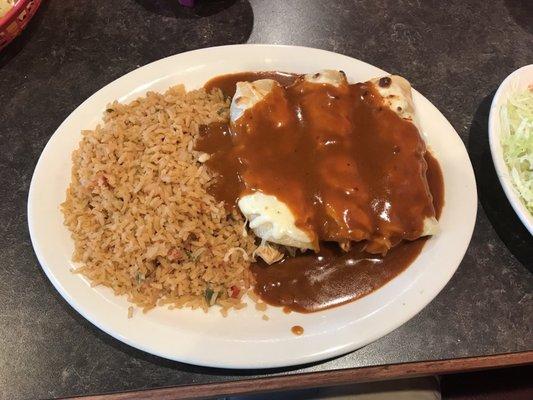 Baileys enchiladas. 3 chicken enchiladas covered with cheese and red sauce. Served with rice.