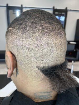 Bald fade with a tail