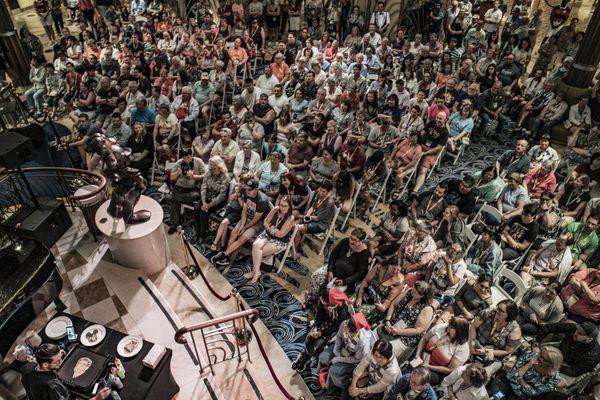 A view of the crowd during a demonstration on a Disney Cruise.