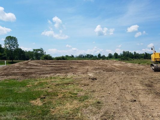 Sand mound graded and capped.