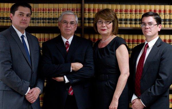 The whole family.  We all work together and clients can pick their preferred attorney.  Chris (left) is working elsewhere, but he'll be back