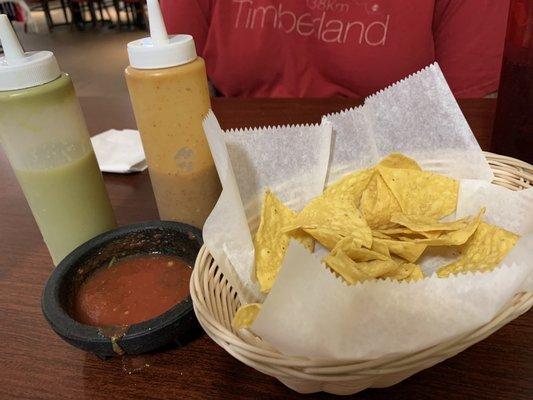 Chips and salsa and two extra sauces