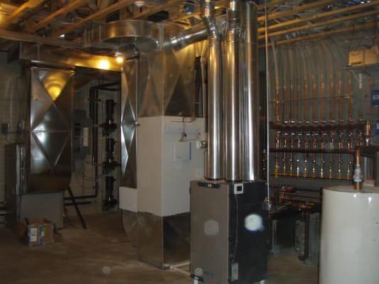 Installation of a Geothermal and in floor heating system.