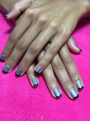 Metallic Gray Gel with Black tips and silver nail art.