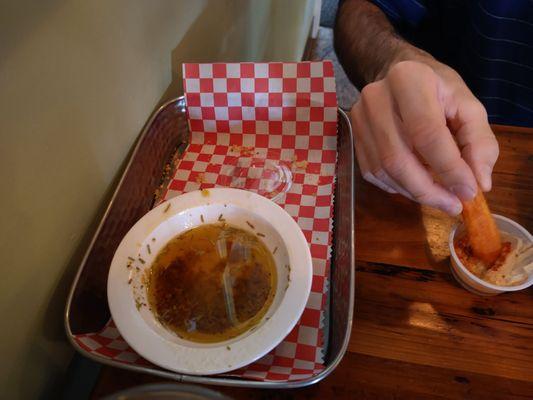 There was sun dried tomato bread in this picture... it's gone now. That olive oil mix doubles as a salad dressing!