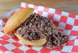 Our signature chopped beef sandwich on a buttered bun.