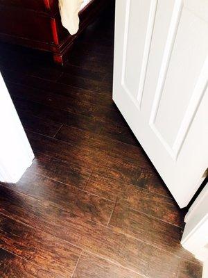 The transition from original flooring to the new flooring 3 years apart!  Looks Great!