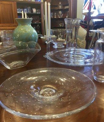 We have a large assortment of beautiful Simon Pearce glass, pottery and Andrew Pearce wooden bowls.