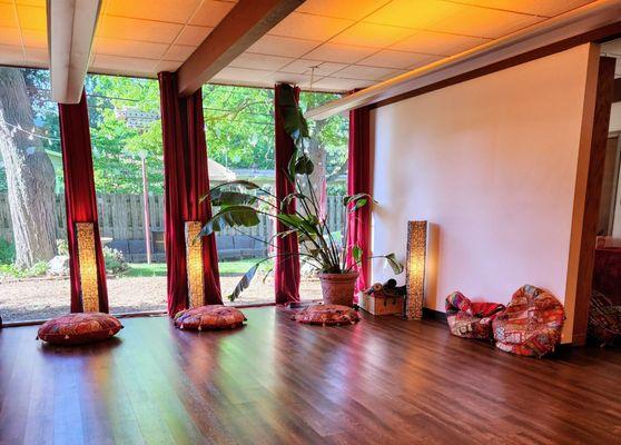 Part of the room for their different classes and events. Setup for the sound bath