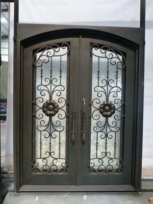 Wrought Iron Double Door Design With Aquatex Glass www.noproblemcustomdoors.com