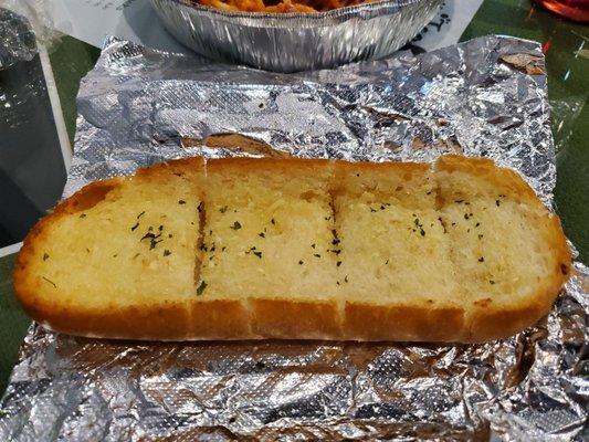 Fresh, hot garlic bread (with real garlic!) comes with each dish.